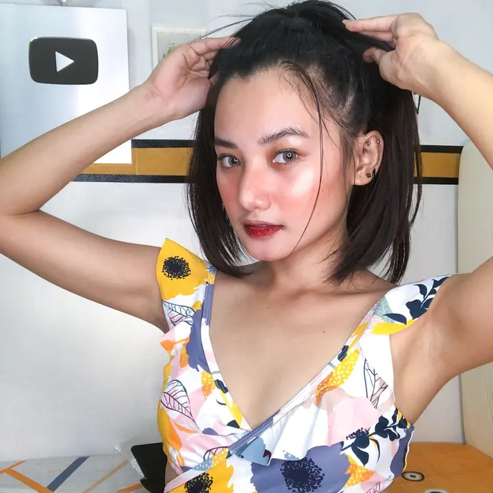 Izza T.