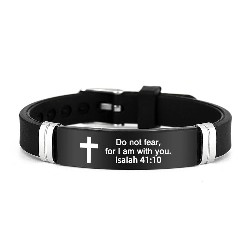 Reference image of a black adjustable scripture wristband with a white cross and Isaiah 41:10 engraving