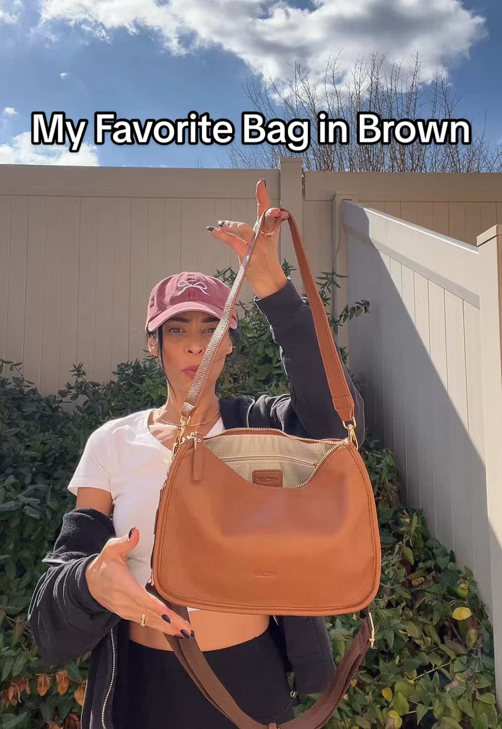 I love this everyday bag so much I had to get it in this pretty brown color! I love that you can wear it crossbody style or as a shoulder bag. #crossbodybag #shoulderbag #everdaybag #purse #womensfashion @HKCLUF US 
