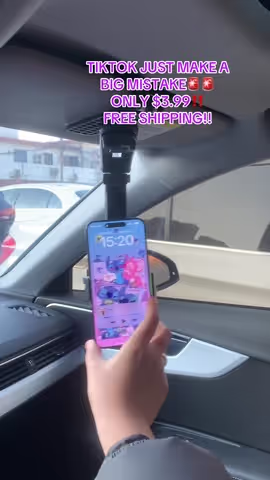 This Cell Phone Holder comes with 76%anadiustable clip that firmly attachesit onto any car's sunvisors withoutdamaging them. it's perfect for longdrives or daily commutes where youneed quick access to yourphonewithout compromising safety!#contentcreation #phoneholder #contentcreatorfinds  #SunVisorMount #carphonemount 