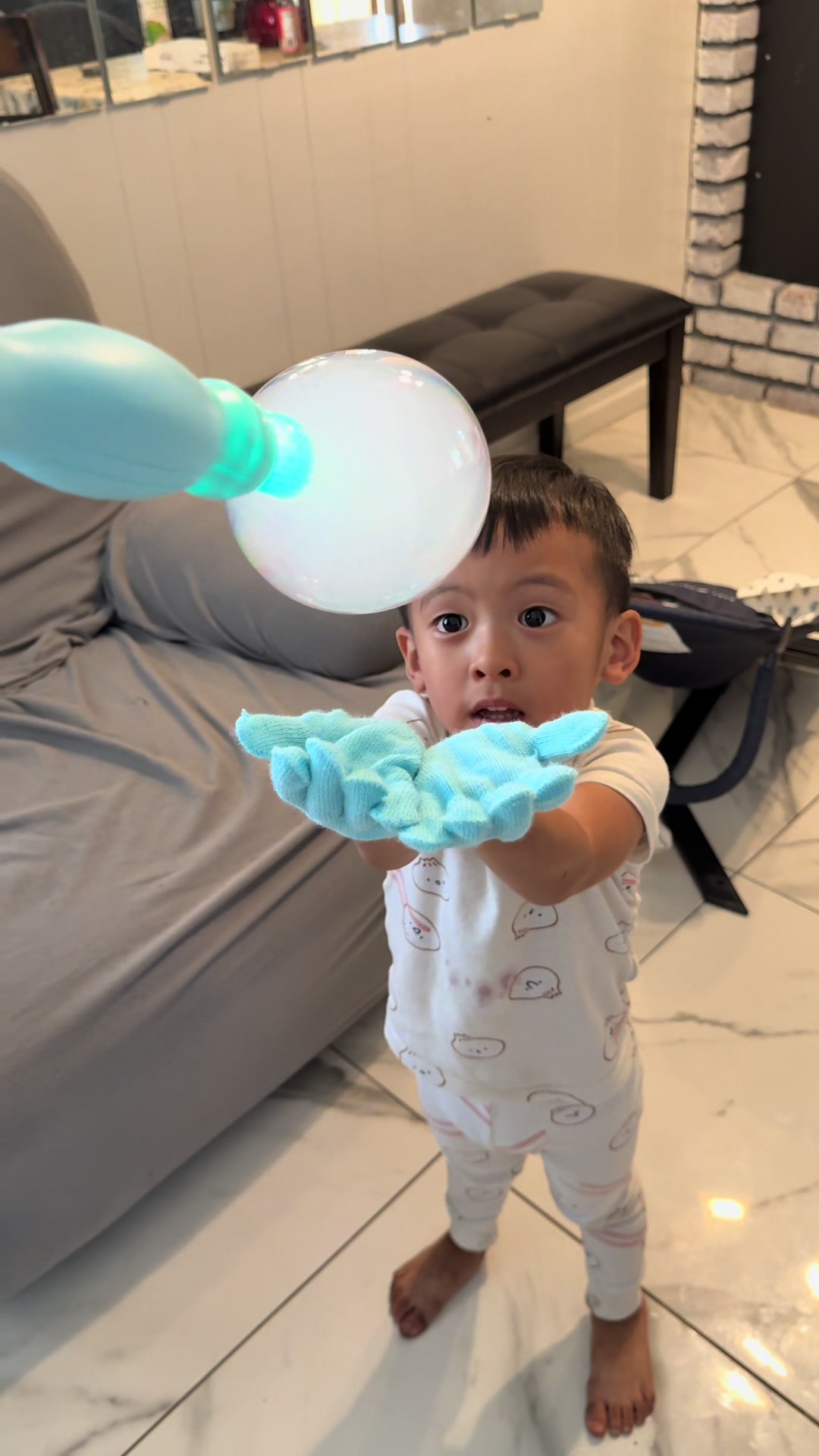 He was so amazed by this and really enjoyed it. #bubbles #bubblemachine #toysforkids #momtok #activitiesforkids 